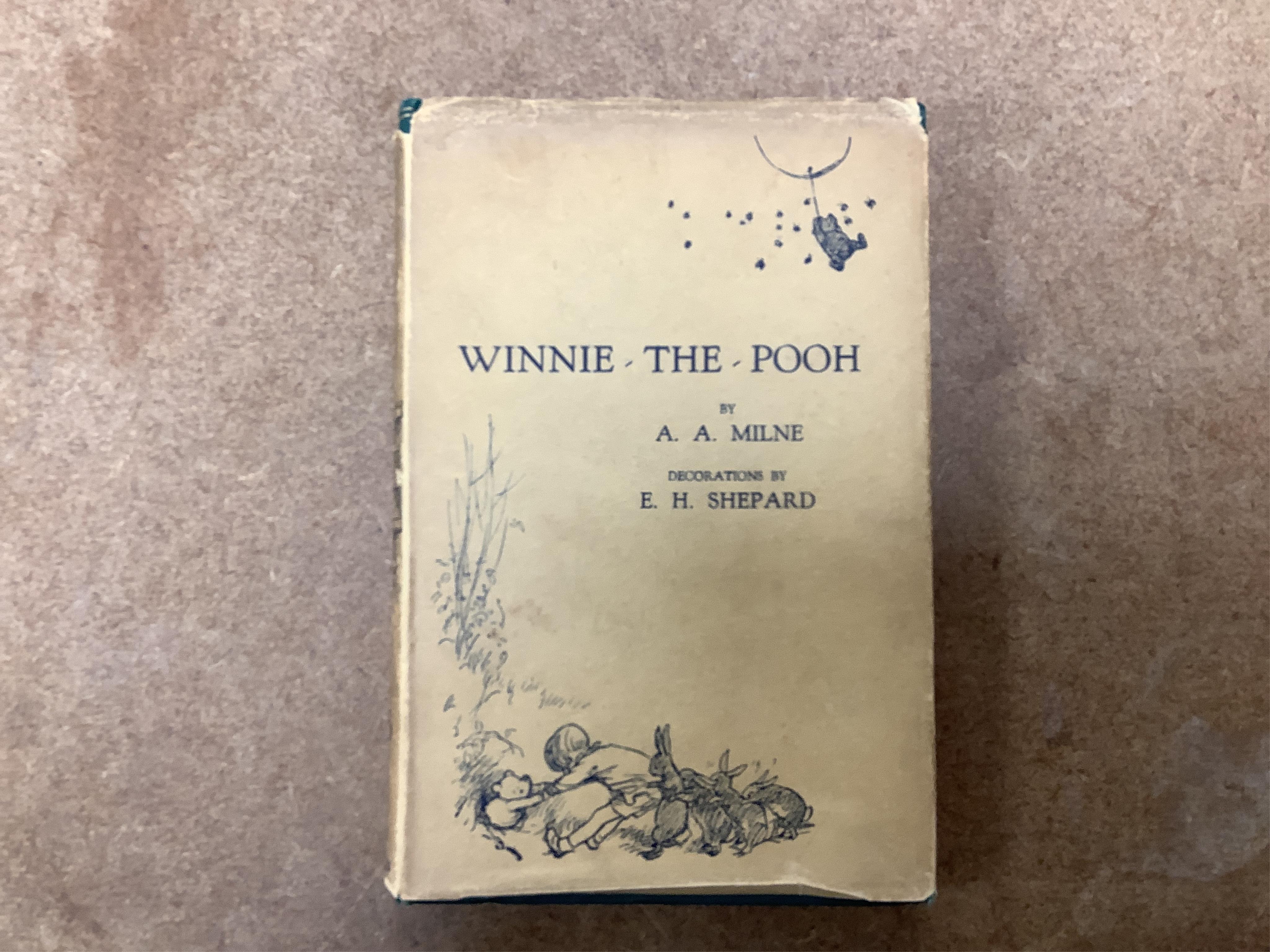Milne, A.A. - Winnie-the-Pooh... with decorations by Ernest H. Shepard. First Edition. title and num. illus. (some full page), pictorial map on e/ps., half title; publisher's gilt ruled and pictorial green cloth, gilt to